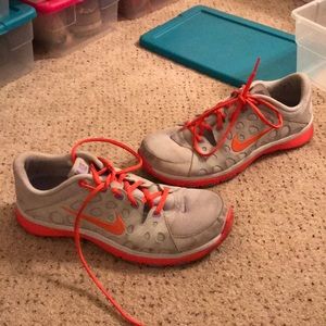 Used orange/grey Nike sneakers
